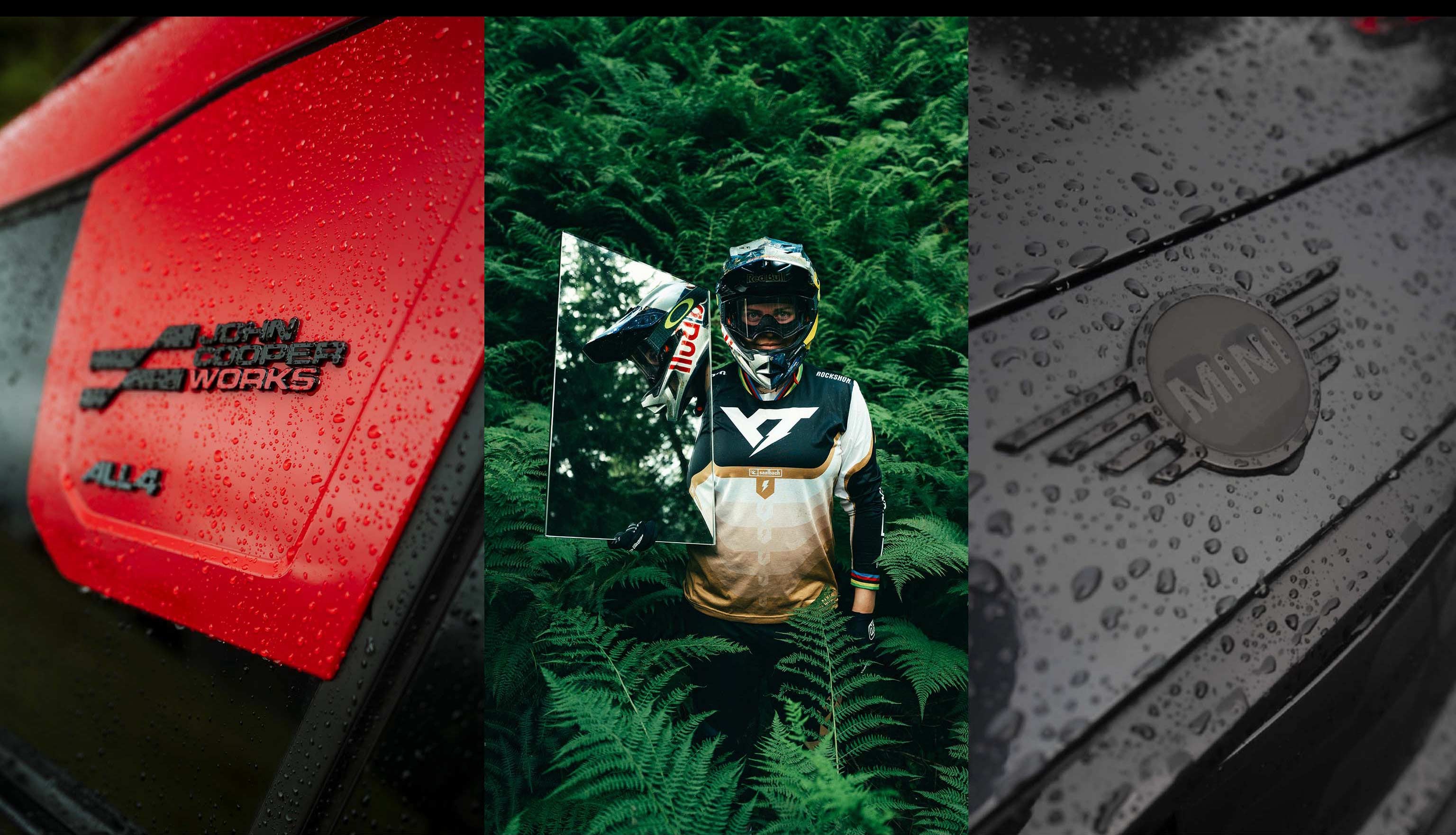 First picture: Close up of the red and black John Cooper Works ALL4 badge on the new MINI John Cooper Works Countryman. Second picture: In personalised gear and heavy-duty helmet, we see Vali’s upper half as she stands holding up a poster of herself and surrounded by thick green foliage. Third picture: Close up of water droplets on the black MINI badge on the black car bonnet.
